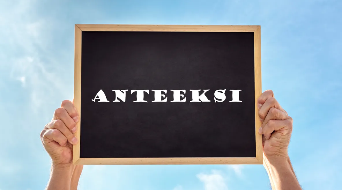 Taulu, johon on kirjoitettu sana &quot;anteeksi&quot;. 