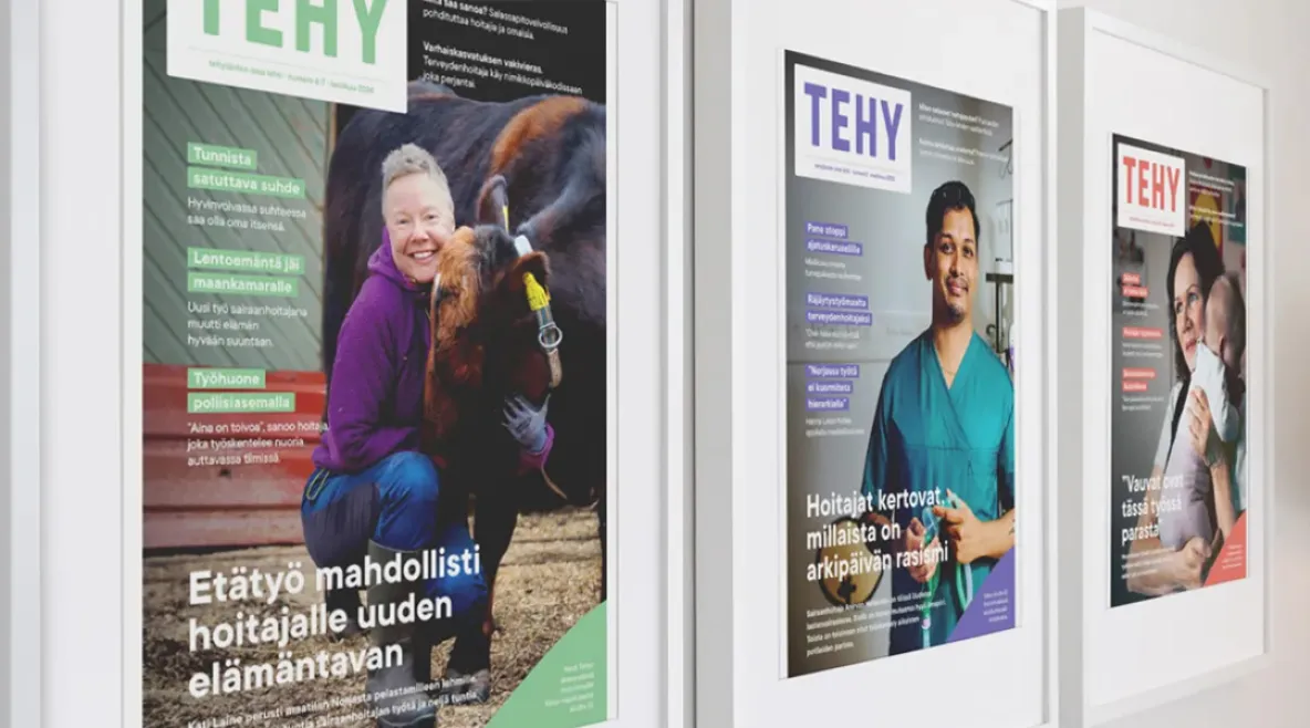 Tehy-lehden kansia kehyksissä seinällä.