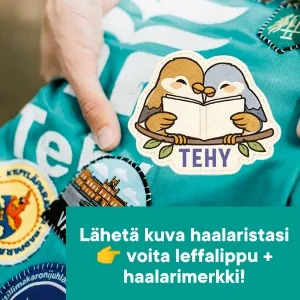 Tehy-lehden haalarimerkki, jossa kaksi lintua lukee oksalla lehteä yhdessä, alla lehden logo.